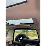 Rear cargo LED light installed in Land Rover Discovery 3 or 4 with aluminum clips and multiple lighting modes (red, yellow, white)