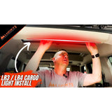Rear cargo LED light installed in Land Rover Discovery 3 or 4 with aluminum clips and multiple lighting modes (red, yellow, white)
