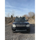 4-light roof pod kit mounted on Land Rover Discovery 3 or 4 with gloss black finish and adhesive no-drill install