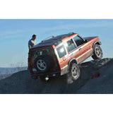 Terrafirma TF809 heavy-duty steel rock sliders with tree bars for Land Rover Discovery 2, black powder-coated with bolt-on installation