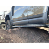 Proud Rhino Rock Sliders for Defender 110 – Frame-mounted 3/16 inch steel with EAS compressor protection and optional professional crating