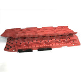 TRED Pro off-road recovery boards with black traction lugs, dual composite construction, and rugged design for sand, mud, and snow