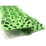 TRED Pro off-road recovery boards with black traction lugs, dual composite construction, and rugged design for sand, mud, and snow