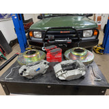 Defender front brake upgrade kit for Discovery 1 LJ LG. Vented rotors, calipers, pads, with optional hard brake tubes.