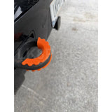 Rubber recovery loop cover kit for Defender L663, sold as a pair in orange or black, protects rear recovery points.