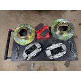 Defender front brake upgrade kit for Discovery 1 LJ LG. Vented rotors, calipers, pads, with optional hard brake tubes.