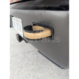 Rubber recovery loop cover kit for Defender L663, sold as a pair in orange or black, protects rear recovery points.