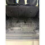 Molded plastic underfloor storage kit for Defender 110 L663, replaces factory foam, jack storage included.