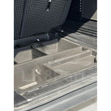 Molded plastic underfloor storage kit for Defender 110 L663, replaces factory foam, jack storage included.